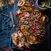 Spiced pomegranate and clementine slow-roast lamb leg
