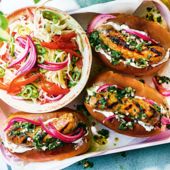 Chimichurri hot dogs with pickled pink onion and pepper slaw