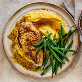 Marmalade-glazed pork chops with spiced carrot and swede mash