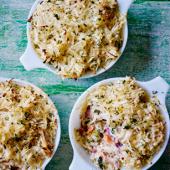 Salmon, bacon and kale pies with celeriac and horseradish rosti topping