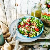 Layered rainbow salad with quinoa and feta