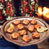 Smoked salmon on rye with quick pickled juniper radishes