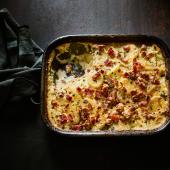Potato and parsnip gratin with bacon and walnuts