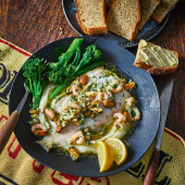 Grilled lemon sole with mussel and caper garlic butter