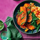 Chipotle aubergine steak with creamed corn and a herby green sauce