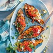 Spicy sausage-stuffed aubergines