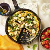 Sausage, chickpea and kale frittata with tomato salad