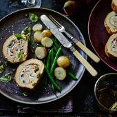 Three-cheese roulade with piquante peppers and olives 