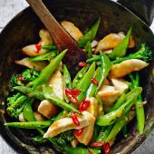 Orange sticky chicken with three green veg