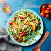 Summer garden salad with peaches and mozzarella