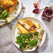 Cheese and cranberry parcels with baby kale salad