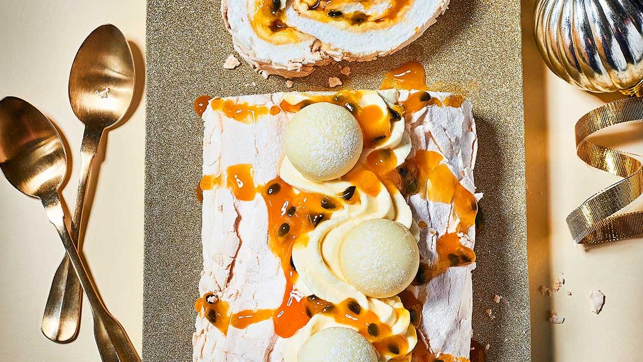 image of Lindor White Choc-Truffle and Passionfruit Roulade recipe by Sainsbury’s Magazine