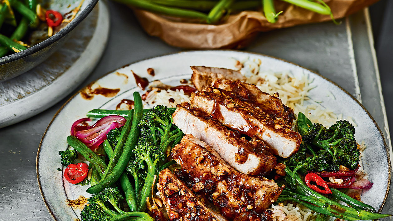 image of Sticky Peanut Pork With Stir-Fried Purple Sprouting Broccoli recipe by Sainsbury’s Magazine