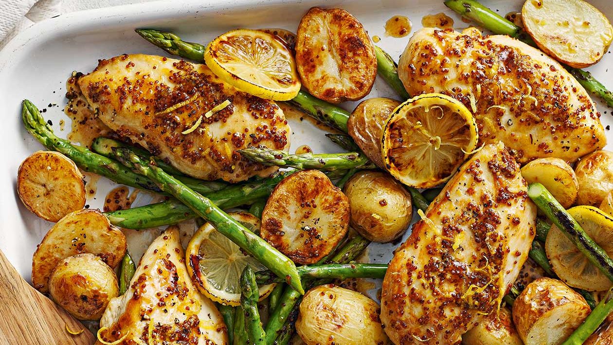 image of Maple Mustard Chicken Traybake recipe by Sainsbury’s Magazine