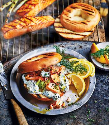 Hot smoked salmon bagels with spring onion and herb soft cheese