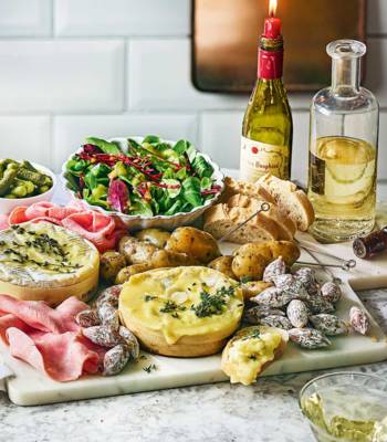 Baked camembert, charcuterie and potatoes