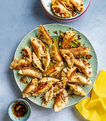 Chicken dumplings in spicy chilli sauce