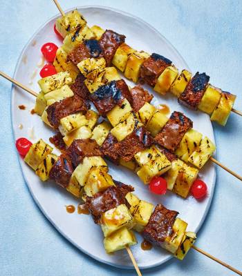 Rum-glazed pineapple and ginger cake skewers
