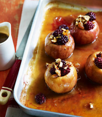 Baked toffee apples with blackberries