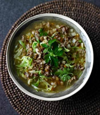 Sausage, lentil and spring greens soup