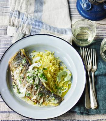 Grilled sea bass with cucumber and basil sauce and saffron pilaf