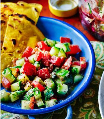 Turmeric socca with cucumber, pepper and tahini salad