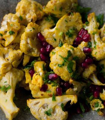 Turmeric roasted cauliflower with tahini and pomegranate