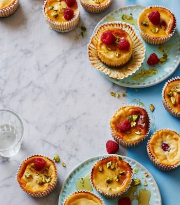 Raspberry and ricotta baked cheesecakes with pistachios and honey