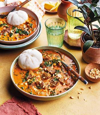 Groundnut beef stew with ground rice balls 