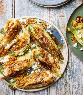 Charred cabbage with spicy brown butter, pine nuts and feta