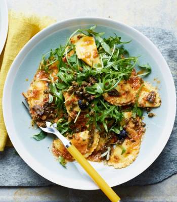 Puttanesca pasta with rocket