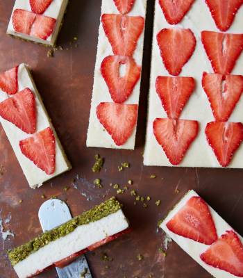 Raw vegan vanilla, strawberry and pistachio cheesecake