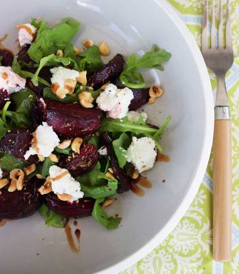 Salad of roasted beetroot, goat’s cheese and hazelnuts on wild rocket