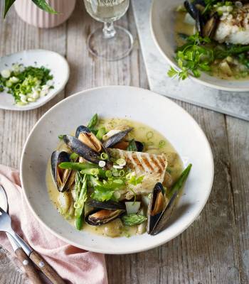 Cod with a spring broth of asparagus, Jersey Royals and mussels