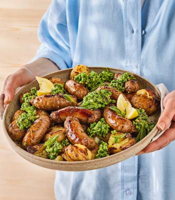 Bangers and 'smash' platter with minty pea pesto