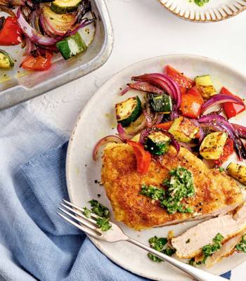 Crispy parmesan pork steaks with roast summer vegetables