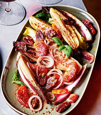 Roasted chicory with blood orange and salted pecans
