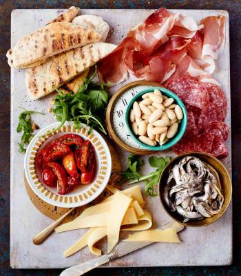 Deli-style antipasti platter with speedy homemade garlic flatbreads