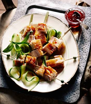 Crispy pork belly skewers with chilli garlic caramel dipping sauce