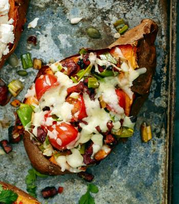 Baked sweet potato with chorizo and melting cheese