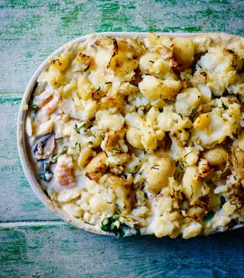 Florentine fish pie with smashed potato and chives