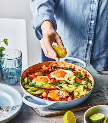 Smoky beans and greens baked eggs