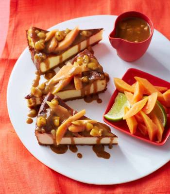 Coconut cheesecake with papaya and macadamia sauce