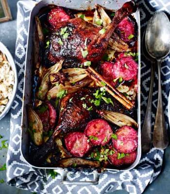 Sticky spiced duck legs  with plums