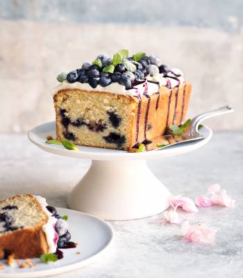 White chocolate and blueberry loaf cake with cheesecake frosting