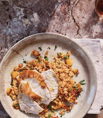 Roast chicken with orange, cumin and apricot rice