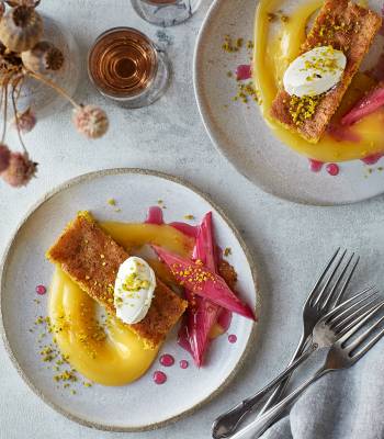 Pistachio polenta cake with poached rhubarb and lemon curd