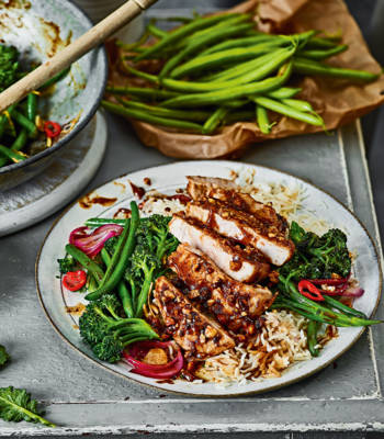 Sticky peanut pork with stir-fried purple sprouting broccoli