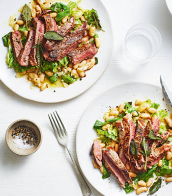 Steak with braised beans and greens