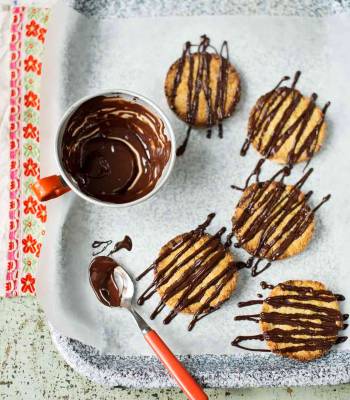 Apricot and almond bumbles with dark chocolate drizzle